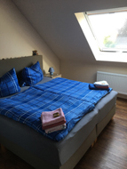 Ferienwohnung Monis Deichperle Sclafzimmer Doppelbett